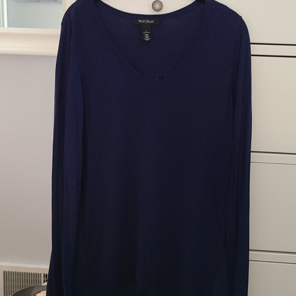 Navy blue long sleeve top with semi-sheer back